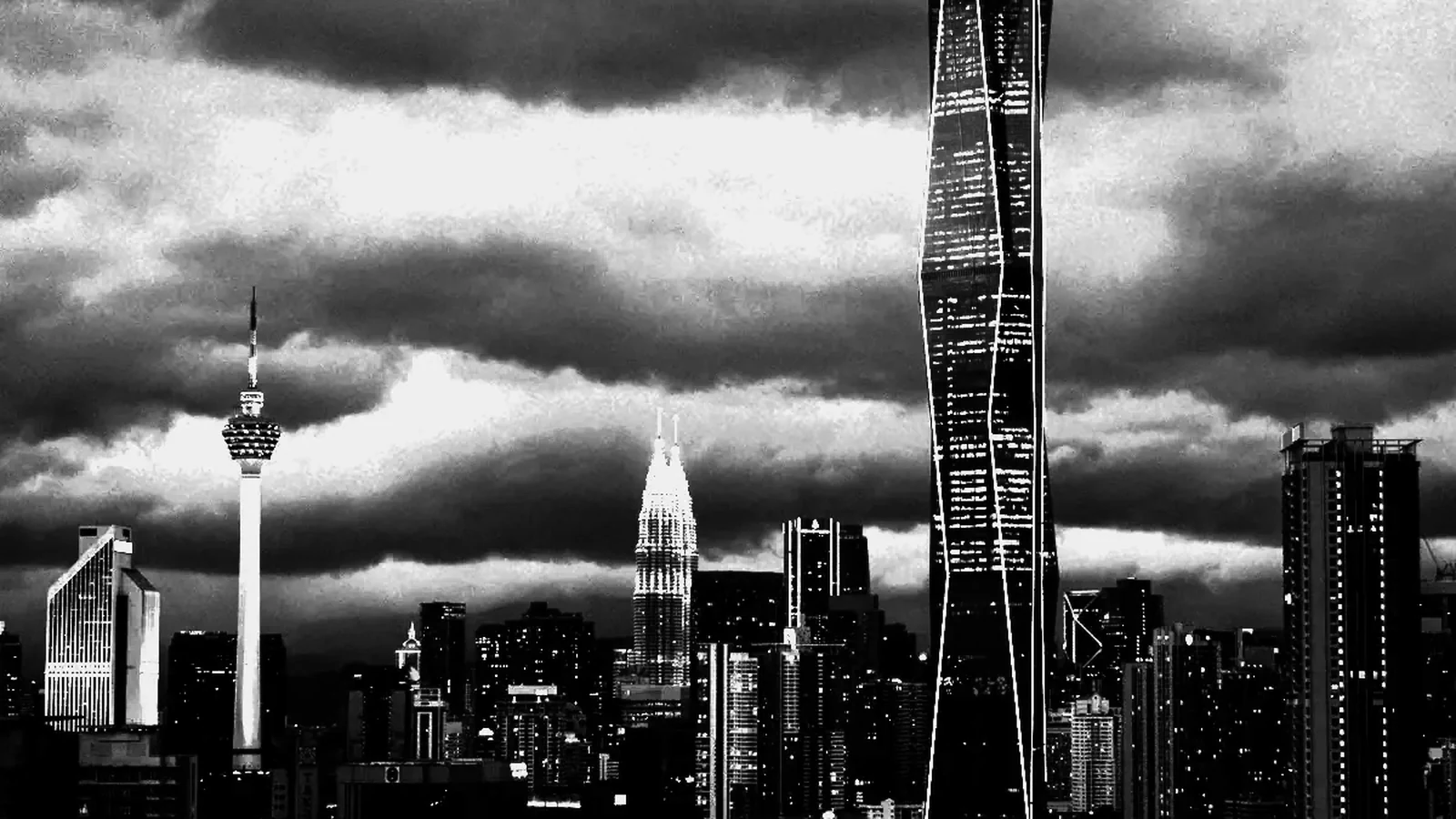 Kuala Lumpur's skyline under a breaking storm