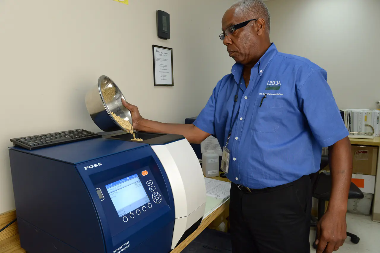 U.S. Department of Agriculture (USDA) Grain Inspection, Packers and Stockyards Administration (GIPSA) Federal Grain Inspection Service (FGIS) employee tests soybean samples at the FGIS inspection laboratory in New Orleans, LA on Monday, Nov. 18, 2013. USDA photo by Anson Eaglin.