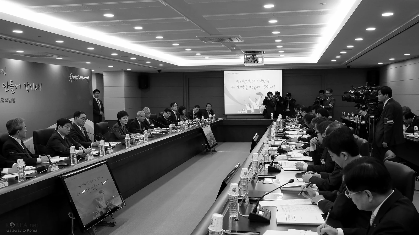 A long conference room in session