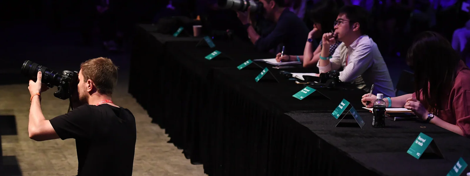 Photographer and journalists at the Centre Stage media desk, RISE 2018, Hong Kong · editorial context