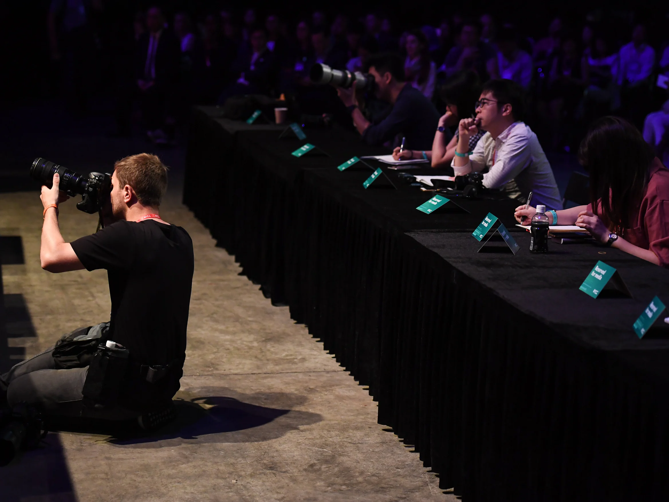 Photographer and journalists at the Centre Stage media desk, RISE 2018, Hong Kong · editorial context