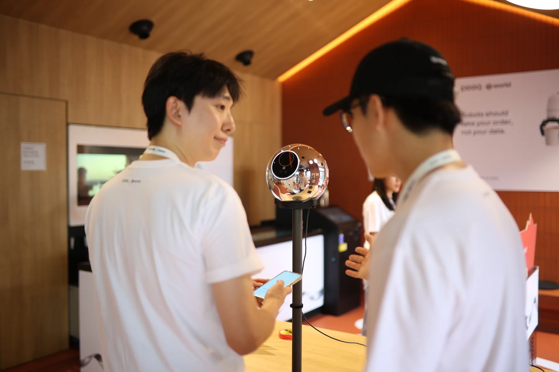 Visitors exploring the Orb at the peaq × World pop-up during Korea Blockchain Week 2026