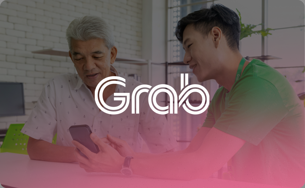 Grab-branded customer-service photo used in Triple-A’s published wallet top-up case study.